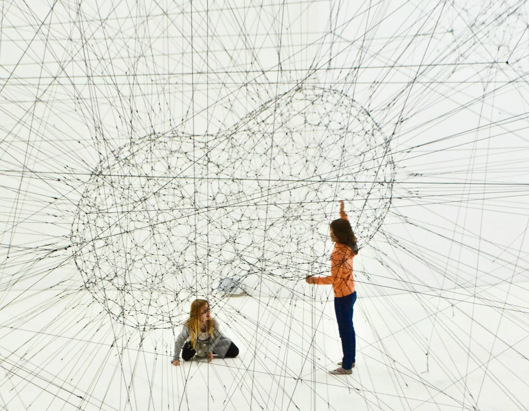 Human interaction inside an abstract neural network illustrating artificial intelligence and connectivity